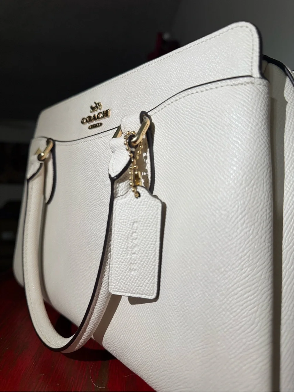 Coach Darcie carryall, with gold accents